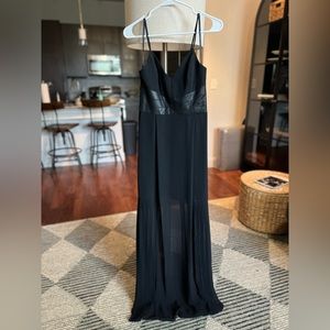 BCBG Size 0, black mixed media dress, never worn